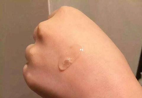 MIZON Snail Ampoules gel on hand for skin hydration and repair