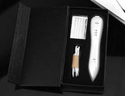 Spot Removal Pen kit with precision tool, replacement tips, and USB charging cable in black box packaging