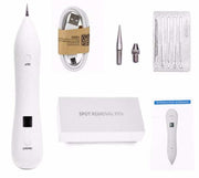 Spot Removal Pen kit with precision pen, USB charging cable, replacement tips, and user manual for dark spot and blemish removal