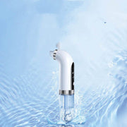 Electric vacuum blackhead acne pore cleaner device with water splash on blue background