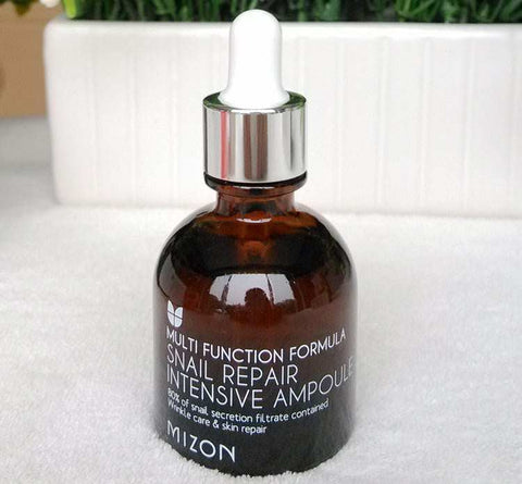 MIZON Snail Ampoules bottle for skin repair and hydration with snail mucin extract