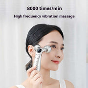 Woman using facial massager roller for skin tightening and lifting with high frequency vibration massage