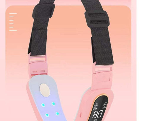 Pink microcurrent face massager with adjustable straps and LED display for facial slimming and wrinkle reduction