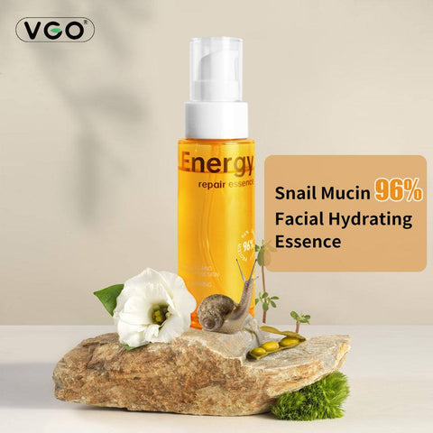 Snail Mucin Energy Repair facial hydrating essence bottle with natural elements on stone background