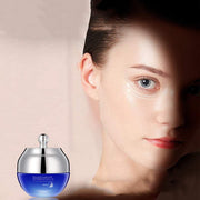 Anti-Wrinkle Firming Eye Cream jar next to woman’s under-eye area showing firming and brightening effects