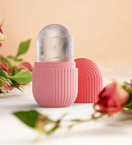 Face Glow Ice Roller with pink ergonomic handle and frosted roller head for cooling and soothing skin care treatment