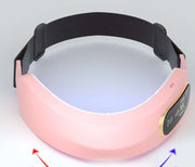 Pink Microcurrent Face Massager with adjustable strap and LED controls for facial slimming and wrinkle reduction