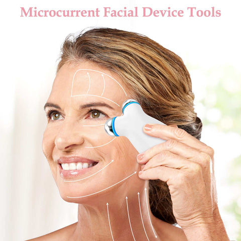 Woman using white microcurrent facial device to reduce wrinkles and firm skin