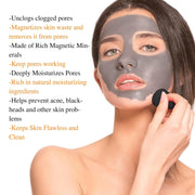 Woman applying Mint Julep Mask charcoal facial mask for acne and pore cleansing